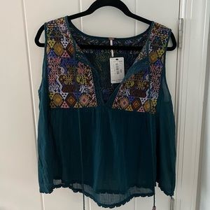 Free people dark teal embroidered tank with tassels
